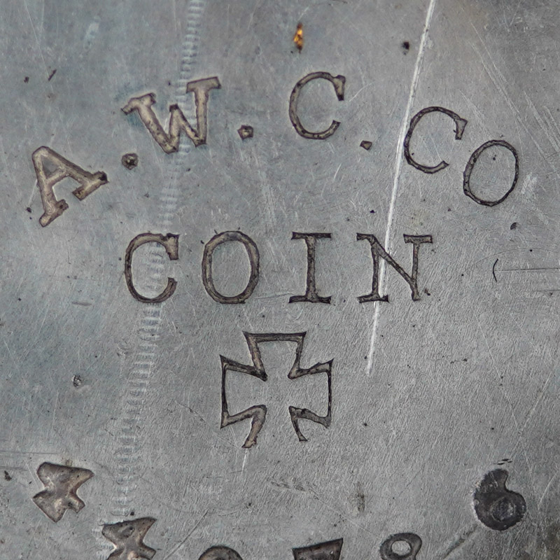 Watch Case Marking for American Watch Case Co. of Toronto, Ltd. AWCCo Coin A.W.C.Co. Coin Cross