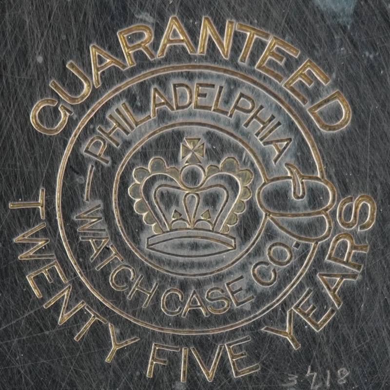 Watch Case Marking for Philadelphia Watch Case Co. Crown 14K/25YR Philadelphia Watch Case Co. Buckle Crown Guaranteed Twenty Five Years in Circle